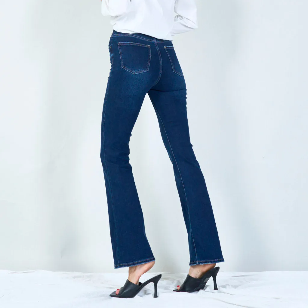 Modern high-waisted flared jeans with raw hem wholesale