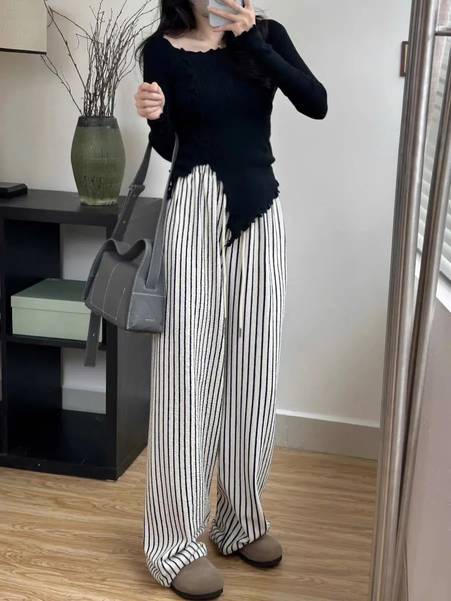 Trendy vertical striped elastic waist wide-leg pants