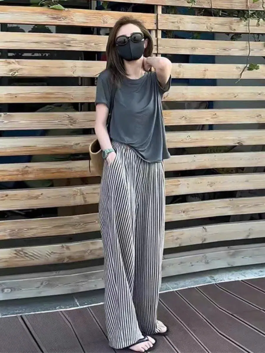 Trendy vertical striped elastic waist wide-leg pants